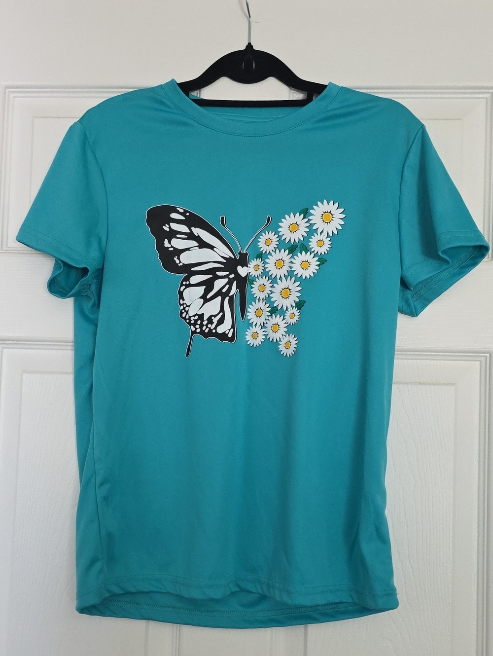 Turquoise Tee with Butterfly & Daisy Graphic
